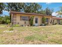 Well-kept one-story home with tidy landscaping and a quaint, inviting curb appeal at 4549 Tippecanoe Trl # 20, Sarasota, FL 34233