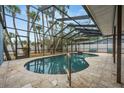 Beautiful screened-in private pool with outdoor seating, offering a refreshing and secluded retreat at 5108 Saint Albans Ave, Siesta Key, FL 34242