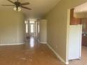 Spacious living room with lots of natural light, awaiting personal touches at 1452 Crazy Horse Dr, Lutz, FL 33559