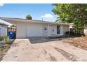 Updated single Gathering home featuring a one car garage, double entry doors and manicured landscaping at 1849 New Hampshire Ne Ave, St Petersburg, FL 33703