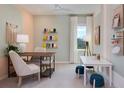 Bright office space with creative wall colors and carpeted floor perfect for working or studying at 42862 Park View Dr, Punta Gorda, FL 33982
