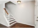 View of a light and bright stairway with dark treads at 609 S Glen Ave # E, Tampa, FL 33609