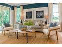 Cozy living room featuring neutral furniture, natural light, and stylish decor at 1079 Signet, Apollo Beach, FL 33572