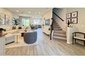 Bright and spacious living room featuring modern furnishings, neutral tones, and stylish decor at 4171 Via Sienna Cir, Sarasota, FL 34243