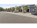 Charming townhome featuring well-maintained landscaping and a private garage at 819 Lucent Sands Ct, Brandon, FL 33511