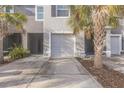 Charming townhome featuring well-maintained landscaping and a private garage at 819 Lucent Sands Ct, Brandon, FL 33511