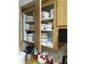 Kitchen cabinets showing dinnerware storage at 6640 121St Ave # 1, Largo, FL 33773