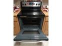 Interior shot of open oven and range in kitchen area at 6640 121St Ave # 1, Largo, FL 33773