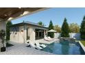 Gorgeous backyard pool with lounge chairs, a spa and a pool house at 4013 W Inman Ave, Tampa, FL 33609