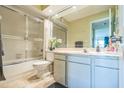 Updated bathroom with shower-tub and vanity at 3805 E Bay Dr # 204, Holmes Beach, FL 34217
