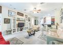 Comfortable living room with neutral walls, carpeted floors, and lots of natural light at 20074 Heritage Point Dr, Tampa, FL 33647