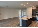Open-concept kitchen featuring an island and ample counter space, perfect for entertaining at 3441 Gramercy Ln, Spring Hill, FL 34609