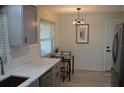 Eat-in kitchen features modern appliances and breakfast area at 9093 108Th St, Seminole, FL 33772