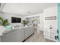 Bright living room with hardwood floors, modern decor, and an open-concept design at 707 63Rd S Ave, St Petersburg, FL 33705