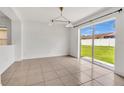 The dining area has a sliding glass door that leads to the backyard at 5145 Prairie View Way, Wesley Chapel, FL 33545