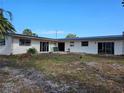 Backyard with lots of potential for renovation and customization, awaiting completion at 801 Marlin Dr, Punta Gorda, FL 33950