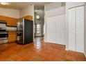 Bright kitchen with stainless steel appliances and access to the living room at 3703 43Rd W Ave, Bradenton, FL 34205