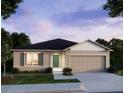 Attractive single-story home with gray siding, green door, and a manicured lawn at 12368 Piping Plover Ave, Weeki Wachee, FL 34614