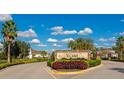 Stone community sign for Vilano, surrounded by beautifully manicured landscaping at 7315 Bianco Duck Ct, Sarasota, FL 34240