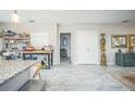 Versatile living area with tile flooring, offering ample space for various activities and storage at 3610 N Tampa St, Tampa, FL 33603