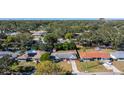 Aerial view showcasing the home's location in a residential neighborhood at 692 Oakwood Dr, Dunedin, FL 34698