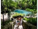 People enjoying a refreshing spring at 13271 Gulf Bay Ln, Spring Hill, FL 34609