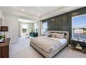 Main bedroom with sitting area and water views at 7479 Rome Ln, Brooksville, FL 34613
