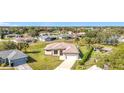 Aerial view showcasing the home's location in a residential neighborhood at 49 Marajo St, Punta Gorda, FL 33983