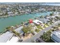 Waterfront home with private dock access, offering serene water views and a desirable coastal lifestyle at 193 Mar St, St Pete Beach, FL 33706