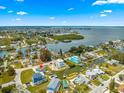Aerial view showcasing home's location on canal, convenient to a bay and the Gulf of Mexico at 6771 Seaview Blvd, Hudson, FL 34667