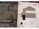 Color scheme sample featuring stone texture, neutral body color, pure white trim, and tricorn black accent at 13362 Quigley Ave, Weeki Wachee, FL 34614