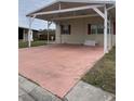 Spacious carport providing ample covered parking for a single-story home at 8343 Fantasia Park Way, Riverview, FL 33578