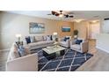 Cozy living room featuring hardwood floors, comfortable seating, and stylish decor at 4510 Limerick Dr, Tampa, FL 33610