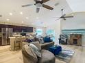 Open-concept living area with vaulted ceilings and plenty of natural light at 6812 Gideon Cir, Zephyrhills, FL 33541
