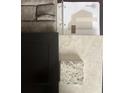 Selection of interior design materials, including stone, cabinet door, granite and neutral flooring samples at 5504 Ocean Breeze Dr, Spring Hill, FL 34609