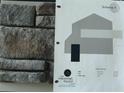 Material selection scheme shows stone siding, trim color, and accent door color selections for new home at 5461 Ocean Breeze Dr, Spring Hill, FL 34609