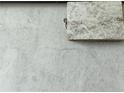 Close-up of a countertop sample featuring a light gray pattern to complement your modern kitchen design at 5514 Ocean Breeze Dr, Spring Hill, FL 34609