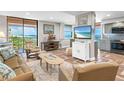 Living room with ocean views, comfortable seating, and open layout at 15316 Gulf Blvd # 301, Madeira Beach, FL 33708