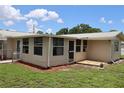 Sunroom addition with windows and a patio at 6702 71St N Ave, Pinellas Park, FL 33781