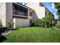 Private backyard with grassy area and white vinyl fence at 4837 Puritan Cir # 2505, Tampa, FL 33617