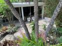 Lush patio with tropical plants at 3301 W Corona St, Tampa, FL 33629