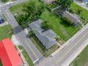 Aerial view of a residential property showing the layout of the house and its surrounding landscaping at 602 E Laura St, Plant City, FL 33563