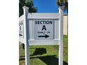 Community signage indicating Section A units 1-24 and Section B units 25-48 at 22481 Westchester Blvd # A19, Punta Gorda, FL 33980