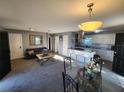 Open concept living room, kitchen, and dining area with modern finishes at 2309 22Nd W Ave, Bradenton, FL 34205