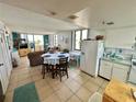 Combined kitchen and living room with ocean view at 6009 Sea Ranch Dr # 301, Hudson, FL 34667