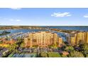 Stunning waterfront building with tennis courts, lush grounds, and marina access at 606 Riviera Dunes Way # 207, Palmetto, FL 34221
