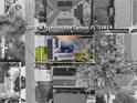 Overhead aerial view of property with solar panels, driveway, and surrounding neighborhood at 2912 W Frierson W Ave, Tampa, FL 33614