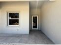 Inviting entryway with tiled floor and ample natural light at 4098 New Milford St, North Port, FL 34288