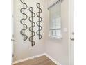 Entryway with neutral walls and a decorative mirror at 6058 Jensen View Ave, Apollo Beach, FL 33572