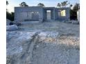 New home construction shows durable concrete walls and a blank canvas for your dream home design at 122 Naomi Pl, Rotonda West, FL 33947